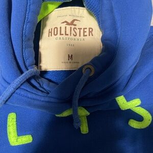 Hollister Blue Sweatshirt with Bright Green Details